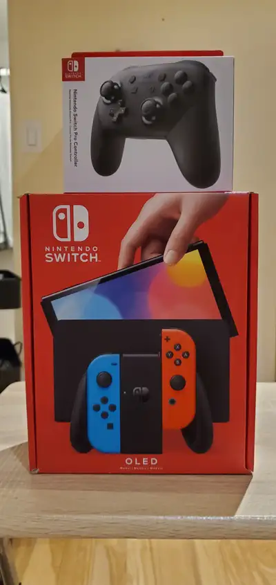 Nintendo Switch Oled Rouge/Bleu avec manette Pro à vendre!, View more