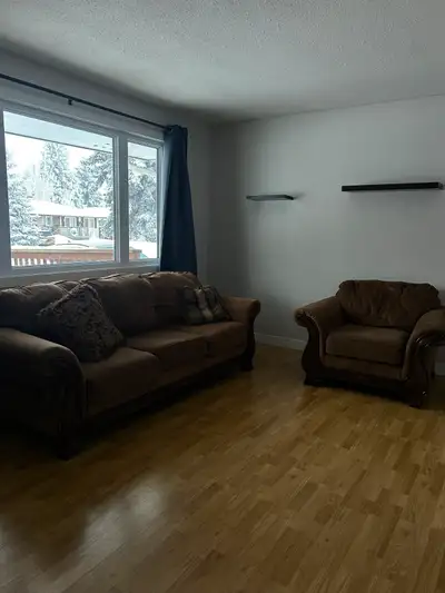 Clean and tidy three-bedroom main-floor home with individual rooms for rent, available June 1st. Ide...