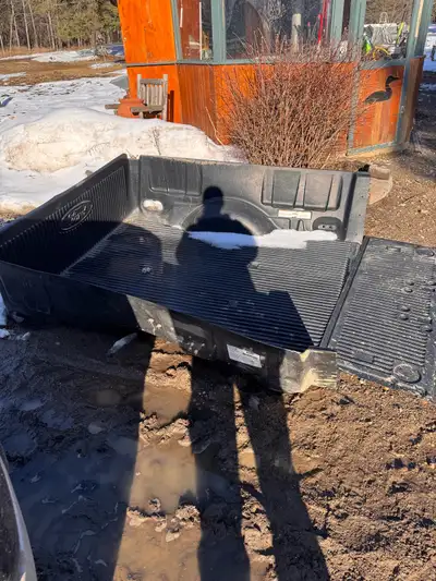 Plastic bed liner for a 6.5 foot bed. Fits 2009-2014 f-150. Located in Cold Lake, AB