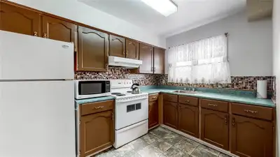 Nice home in decent neighborhood, with 4 bedrooms, large living room, bath/kitchen/dining room, plus...