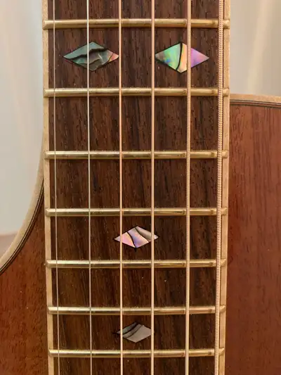 Left handed all solid mahogany guitar , View more