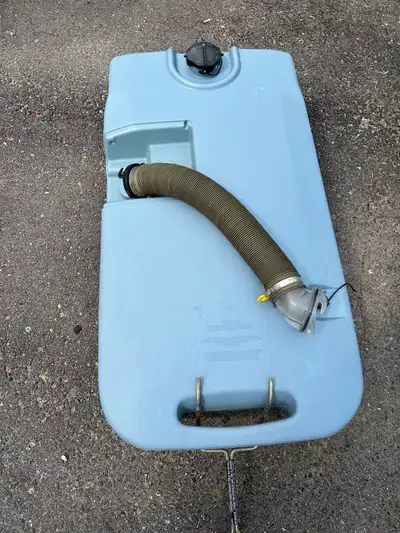 Portable waste tank for recreational vehicle,
