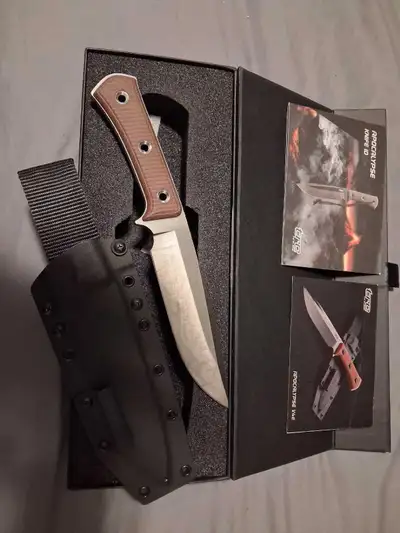 This pre-owned TRC Knives Apocalypse fixed blade knife is a high-performance survival tool featuring...