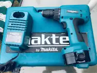 USED ONCE MAKITA CORDLESS 14.4V DRILL WITH ONE BATTERY ,CHARGER