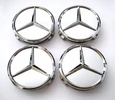 À vendre = Petits enjoliveurs de Mercedes. 3 pouces de diamètre ou 75mm. Tout argentés ou avec fond...