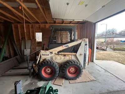 Used Bobcat skid-steer loader, rear wheel bearing leaks, needs a tune-up, otherwise in good working...