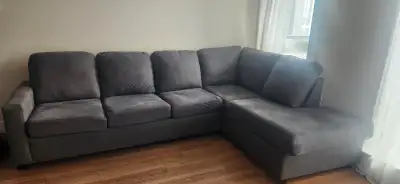 Fairly new sectional grey couch, View more