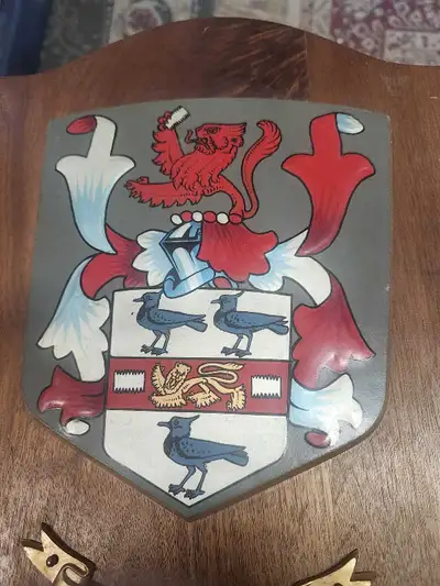 Displaying a touch of history and heritage, this Penney family coat of arms plaque is a unique decor...