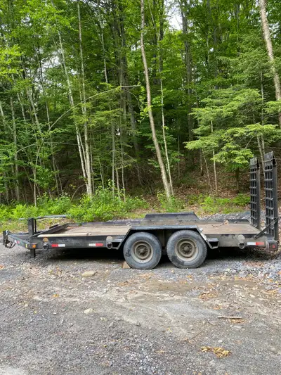 Heavy duty float trailer 7000lb axles, deck is 16’6 long. Full steel checker plate deck and fenders...