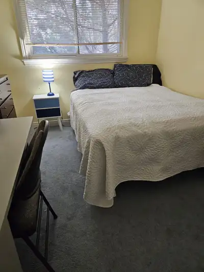 Bright upstairs bedroom available in a quiet home. The room comes fully furnished with a bed, two dr...