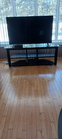 TV stand black tempered glass $150