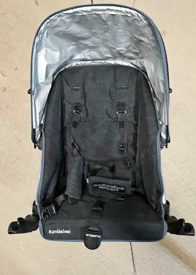 This is a used UPPAbaby RumbleSeat in good condition, designed to convert your UPPAbaby VISTA stroll...