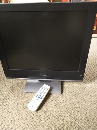 19 in side to side, remote missing battery cover.