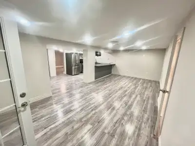 Welcome to this newly renovated 2 bedrooms basement apartment! It features a modern kitchen with sta...
