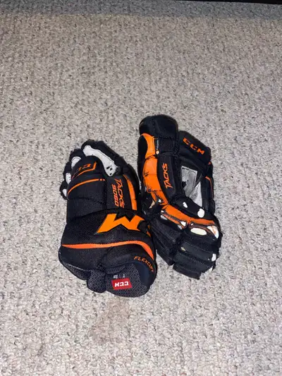 CCM hockey gloves, View more