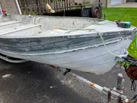 Old boat 14 ft aluminum boat