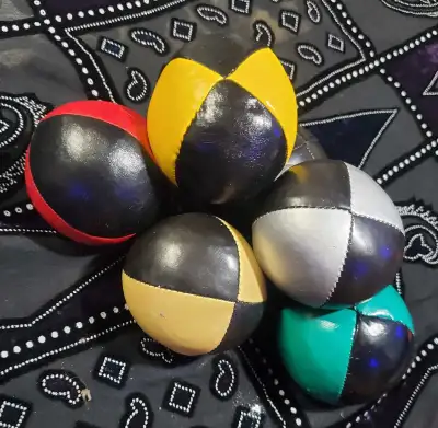 Set of six higgins professional juggling balls in various colours. Each ball measures approximately...