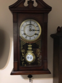 Vintage Delta 31 day key winding wall clock. 
