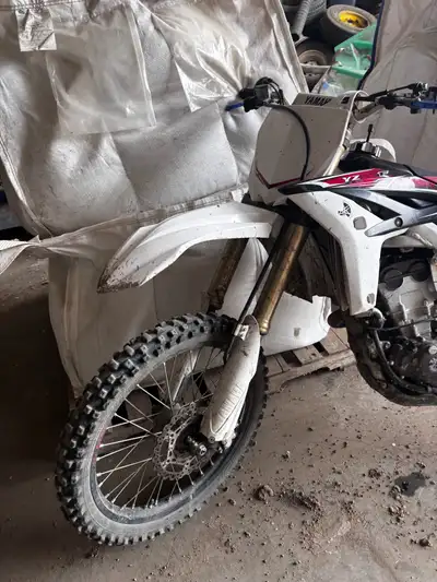I'm selling my used 2011 Yamaha YZ250F dirt bike. It's a reliable bike that has served me well on th...