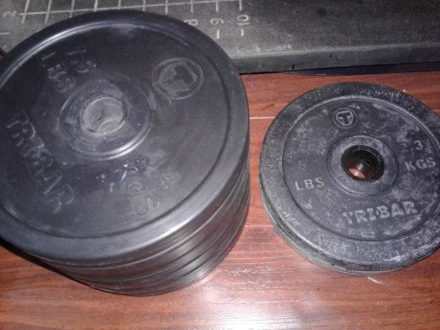 Rubber coated 1 inch hole weight plates: dollar per pound  in Exercise Equipment in City of Toronto