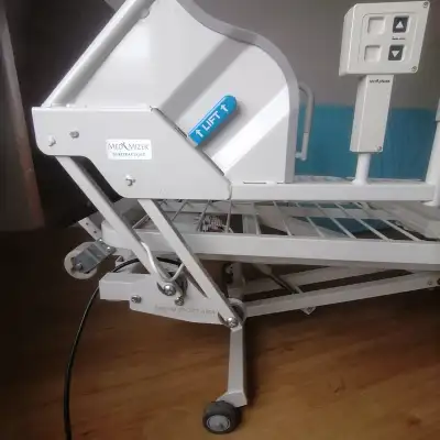 used med mizer  hospital bed for sale $200, View more