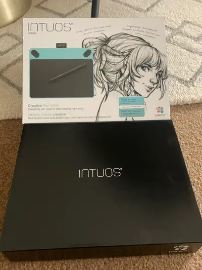 I'm selling an almost-new Wacom Intuos Draw creative pen tablet, perfect for anyone looking to explo...