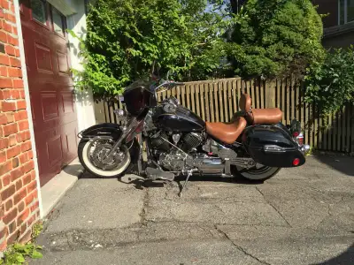 Stunning bike with all Yamaha branding badging removed, converted to look like a Harley Road King. B...