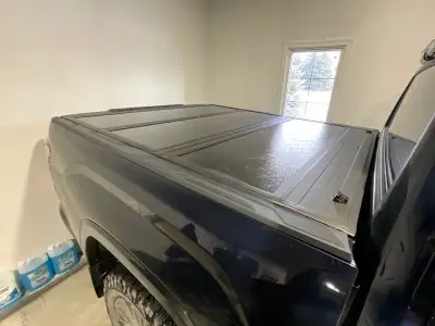 Folding hard cover for new gen short box Toyota Tundra. Used for 10,000 km, great shape. Folds up co...