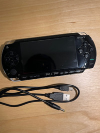 PSP 1000 (comes with 2000 games)