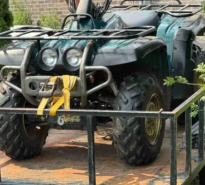 Runs and drives fine needs a battery . Has winch and plow