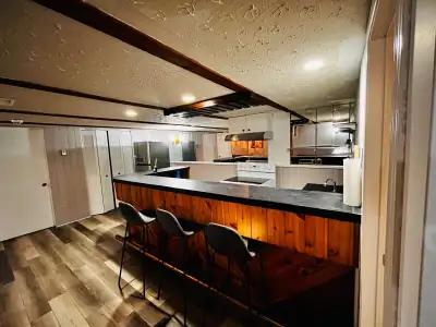 A clean and private **studio\-style basement unit** available for rent, featuring: • Private garage...