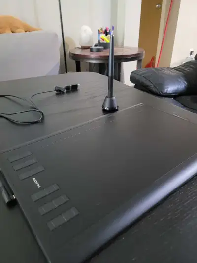 I'm selling my used Huion Tablet. Didn't ever use it, had bought it for the purpose of playing Osu!...