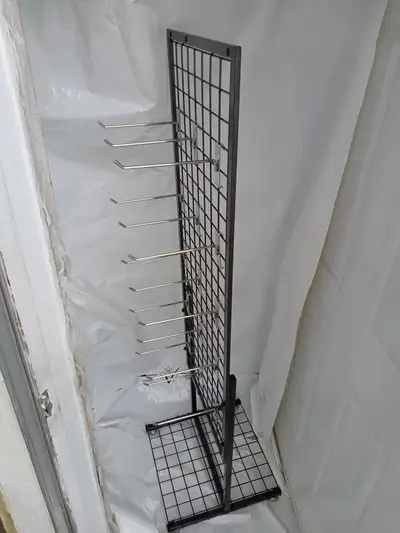 Metal display stand with hooks, View more
