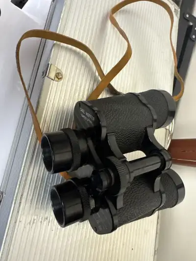 I'm offering a pair of Carl Hoffer coated optics binoculars, perfect for bird watching or outdoor ad...