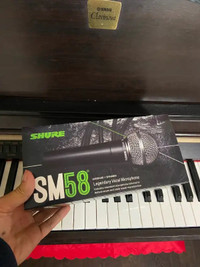 Selling Shure SM58 Microphone (new)