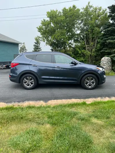 2016 Hyundai Santa Fe Sport , one owner lady driver, 4 cylinder, AWD, A/C, works great, excellent ga...