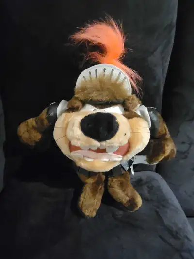 This is a fun and unique Looney Tunes Taz Knight plush toy, perfect for collectors or as a playful a...