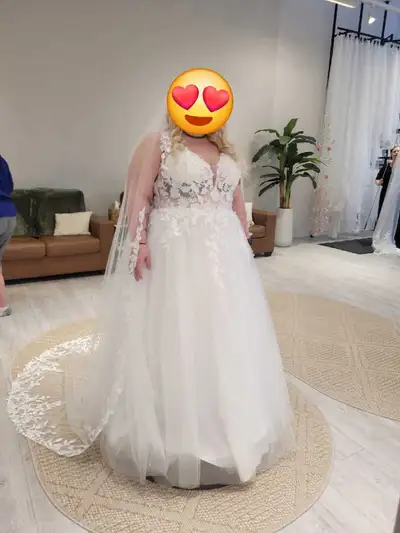 Never been altered size 24 Ivory wedding dress and veil , View more
