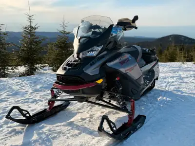 Great sled New track with studs New muffler on warranty 11000km Plastic damage on the inside from mu...