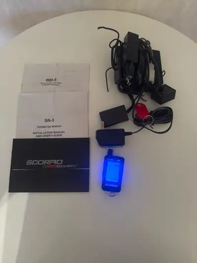 Scorpio 2 way alarm Remote has rechargeable battery and charger Comes with manuals and everything it...