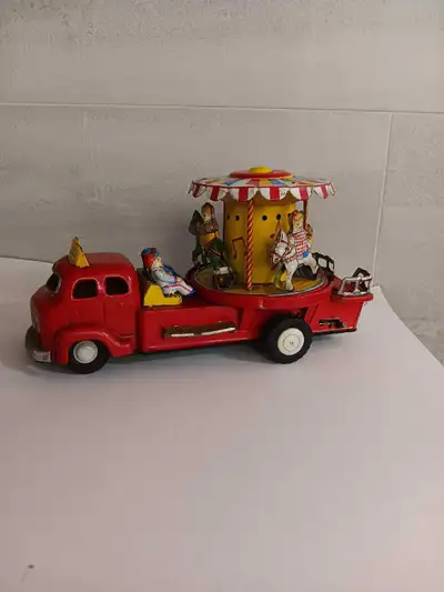 Vintage Nomura Tin toy Merry Go Round, View more