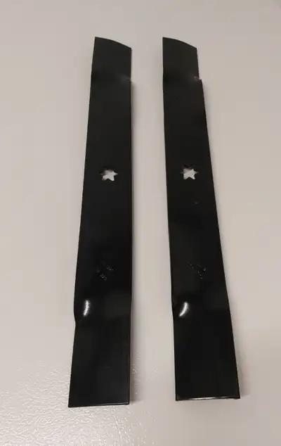 Two 22" Cub Cadet riding mower and RZT  blades. #742-04214, View more