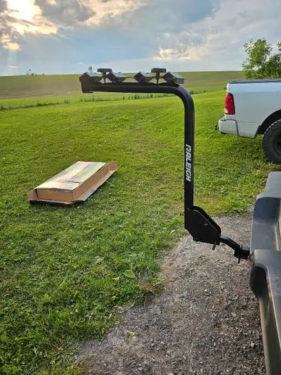 Brand new bike rack. Attaches to a trailer hitch receiver. Never used attached for the picture. Pick...