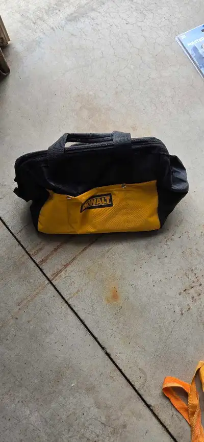 This is a used DeWalt tool bag, perfect for keeping your tools organized on the go. It's in good con...