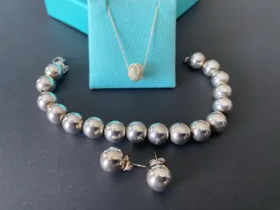 Authentic Tiffany’s Jewelry set. Includes 10 mm bead bracket and earrings and Tiffany’s Knott Rope n...