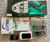 Collection of Vintage Cell Phones and Accessories