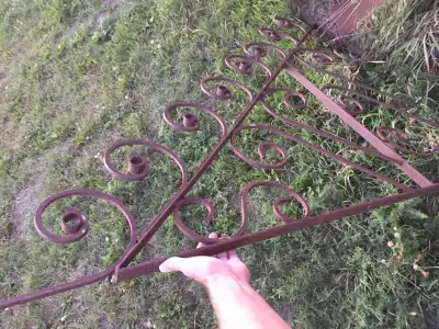 Add a touch of vintage charm to your home or garden with this wrought iron decorative piece! Measuri...