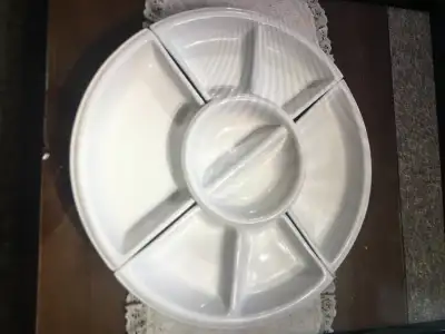 White Porcelain Lazy Susan Style serving Platter on Black Turning Table
