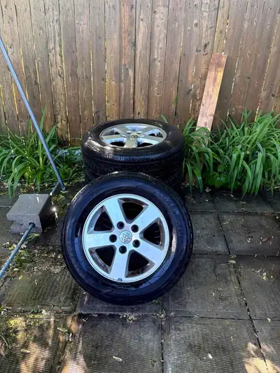 Dodge Rims Bolt Pattern 5 x127 and Tires yokohama 225/65R16 all saison I am selling a set of four Do...