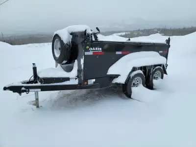 2021 dump trailer, very low km and gently used since summer 2022. 5' x 10' with tall sides. Sloped f...